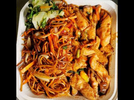 Chicken in oyster sauce may be paired with noodles and vegetables. 