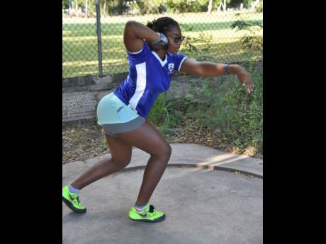Maja Henry, member of the Immaculate Conception High School Track and field team during shot put training on Friday, March 18.