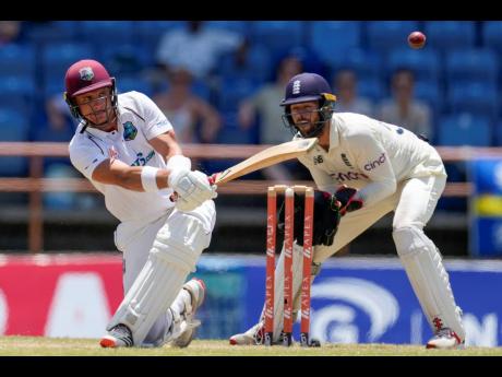 Credit: AP Photo
West Indies’ Joshua Da Silva hits a four from the bowling of England’s Jack Leach during day three of their third Test cricket match at the National Cricket Stadium in St George, Grenada, yesterday.