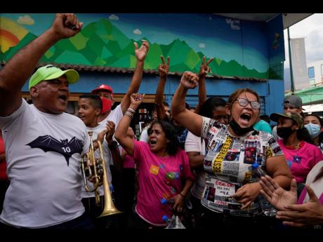 Demonstrators shout “Free Alex Saab!” as they demand the release of Colombian businessman Alex Saab who has been extradited to the US, during a protest in the Petare neighbourhood of Caracas, Venezuela, on Monday.