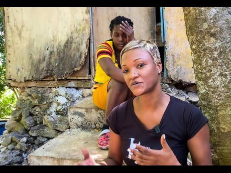 Michelle ‘Boss Mom’ Gordon (right), with the help of other donors, will be building a house in Ridge Town, St Elizabeth, for Delmoi Bailey (left) and her four children, which is expected to be handed over on Mother’s Day. 