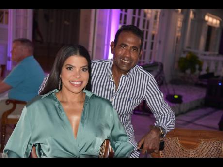 Richard Ferdinand (right) stopped for a photo with Tanisa Samuel. 