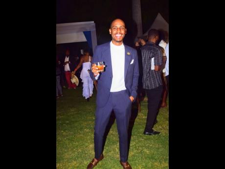 Credit: Anthony Minott We snapped Festival Director of Jamaica Rum Festival and CEO of Mystique Integrated Services, Valon Thorpe moving through the crowd with rum in hand and a smile on the face.