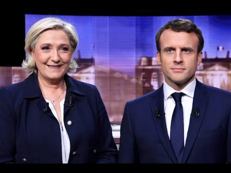 French presidential election candidate for the far-right Front National party, Marine Le Pen,  and French presidential election candidate for the En Marche! movement, Emmanuel Macron.
