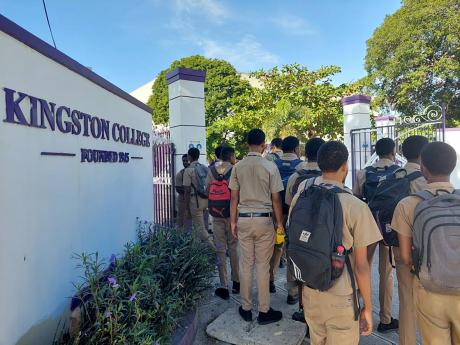 Kingston College students are barred from entering school on Tuesday because of their hairstyles. 