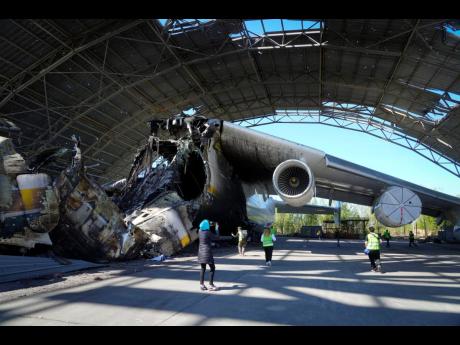 The gutted remains of the Antonov An-225, world’s biggest cargo aircraft destroyed during recent fighting between Russian and Ukrainian forces, at the Antonov airport in Hostomel, on the outskirts of Kyiv, Ukraine, yesterday.