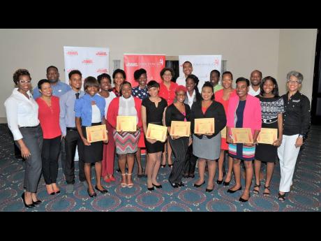 
JMMB Joan Duncan Foundation 2018/19 scholarship recipients with the JMMB Joan Duncan Foundation team. 