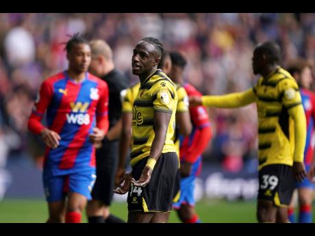 
Watford’s Hassane Kamara reacts to being shown a red card, during the Premier League match between Crystal Palace and Watford at Selhurst Park, London, yesterday.