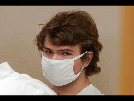 Payton Gendron appears during his arraignment in Buffalo City Court. Gendron was arraigned on first-degree murder charges and ordered detained without bail. Police officials said the 18-year-old was wearing body armour and military-style clothing when he p