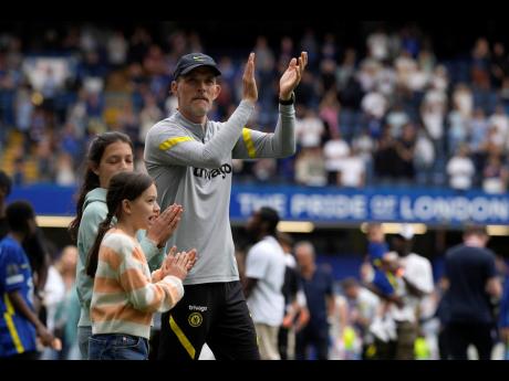 Chelsea’s head coach Thomas Tuchel applauds to supporters after winning the English Premier League soccer match between Chelsea and Watford at Stamford Bridge stadium in London on Sunday, May 22, 2022.