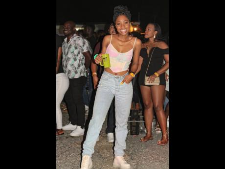 Dressed in a cropped bustier top, baggy jeans and boots,  Brithney Clarke reported for the festivities mindful of the 2000s. 