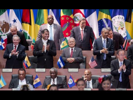 President Barack Obama, right middle row, and Cuba's President Raúl Castro, left middle row, with other leaders during the inauguration ceremony of the Summit of the Americas in Panama City, in April 2015. 