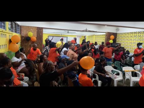PNP supporters at a divisional conference in Buff Bay, Portland. on Sunday.