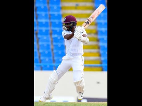 Kraigg Brathwaite of the West Indies cuts for four during Thursday's day one  of the  first Test between Bangladesh and West Indies at  Sir Vivian Richards Cricket Stadium in North Sound, Antigua and Barbuda.