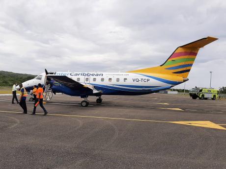 The interCaribbean Airways plane that made the inaugural commercial flight to Ian Fleming International Airport. 