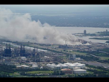 Credit: AP
A chemical fire burns at a facility during the aftermath of Hurricane Laura, August 27, 2020, near Lake Charles, Louisiana.