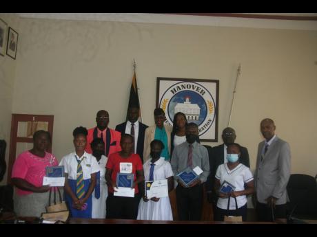 Awardees with parents and representatives from the Hanover Municipal Corporation, pose for a photograph after receiving grants from the Board of Supervision.