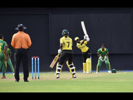 Jamaican opening batter Rashada Williams plays a shot while watched by her captain Stafanie Taylor duing a CG United Women’s Super50 Cup game against the Windward Islands on Monday. 