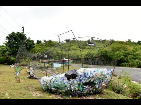 Credit: Kenyon Hemans More uncollected garbage spoil the aesthetics of the St Elizabeth countryside.