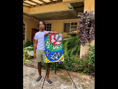 Visual artist CoryKevaun poses with his favourite piece, ‘Summer in January – Protect Her’, inspired by the elements of nature.