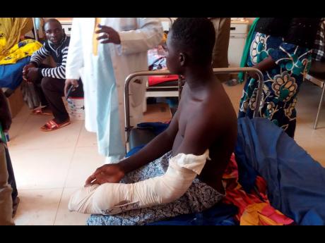 Bakery Tolofoudie, 15, from Diawely, is treated at Somine Dolo Hospital in Mopti, Mali. Saganla survived an attack by nearly 100 jihadis on motorbikes who had gathered in his village. At least 132 people were killed in several villages.