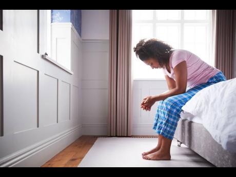 Credit: A woman showing signs of depression