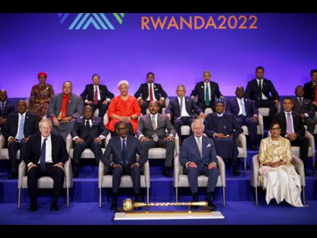 Leaders of Commonwealth nations are photographed on Friday, June 24, 2022, during the opening ceremony of the Commonwealth Heads of Government Meeting in Kigali, Rwanda. Seated in the front row from left are: British Prime Minister Boris Johnson, Rwandan P