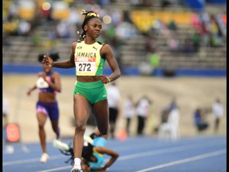 Credit: Gladstone Taylor/Multimedia Photo Editor Brianna Lyston cruises to girls’ Under-20 200-metre title at the 49th staging of the Carifta Games at the National Stadium on April 18.
