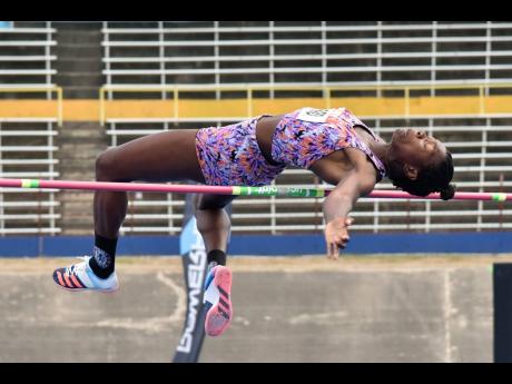 High jumper Kimberly Williamson clears 1.88 metres to win the national title on the opening day of the National Senior and Junior Championships at the National Stadium last Thursday. 