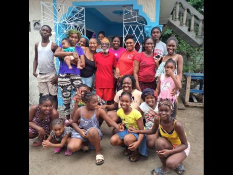 Credit: Contributed Theodore Brown is surrounded by some of his descendants.