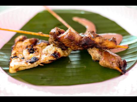 Credit: Stephanie Lyew The jerked chicken skewers served with a jerk mayo sauce and garlic naan was a fancy presentation of Jamaican street food injected with Middle Eastern flavour.