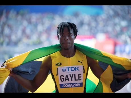 World Champion Tajay Gayle celebrates winning the the men’s long jump finals with a jump of 8.69M at the 2019 IAAF World Athletics Championships  held at the Khalifa International Stadium in Doha, Qatar, on Saturday, September 28, 2019. 