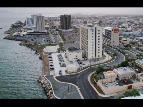 
The China-aided new head office of the Ministry of Foreign Affairs and Foreign Trade of Jamaica, North-South highway and the Confucius Institute at The University of the West Indies, Mona are witnesses and symbols of China-Jamaica friendship and cooperati