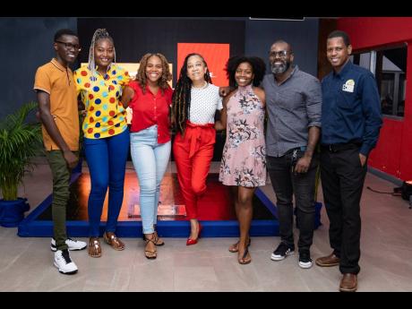 Red Stripe Head of Corporate Affairs Dianne Ashton-Smith (centre) with the top three finalists in the Reel Responsibility competition at the official awards ceremony held recently at the Red Stripe Brewery on Spanish Town Road. From left: Second-place winn