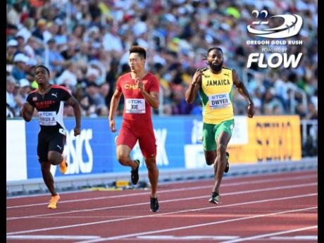 Credit: Gladstone Taylor Jamaica's Rasheed Dwyer (right) battles with China's Zhenye Xie (centre) for a qualification spot in the men's 200-metre semifinals during their first-round heat at the World Athletics Championships inside Hayward Field Eugene, Oregon earlier this evening.