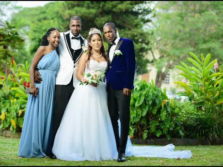 Credit: Sebastian Photography Mr and Mrs Vanzie were excited to celebrate this special occasion with their children, Krishelle Vanzie (left) and Saiheif Foster.