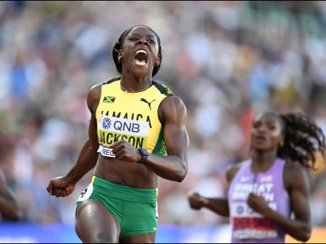 Credit: Gladstone Taylor World 200 metres Champion, Jamaica’s Shericka Jackson, celebrates her victory in the final of the event in Eugene, Oregon last night. Jackson clocked a national and championship record 21.45 seconds.
