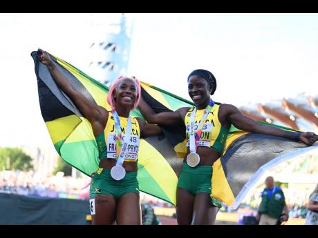 Credit: Gladstone Taylor Shelly-Ann Fraser-Pryce (left), silver medallist, and World champion Shericka Jackson celebrate a 1-2 in the women’s 200m final at World Athletics Championships at Hayward Field in Oregon on Thursday, July 21.