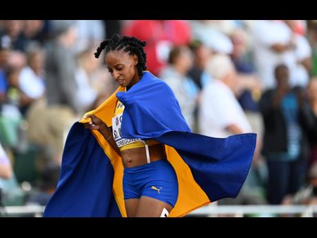 Barbados’ Sada Williams celebrates mining bronze in the 400 metres on day eight of the World Athletics Championships at the Hayward Field in Eugene, Oregon on Friday. 