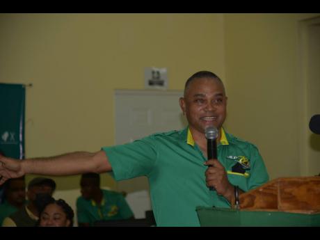 Credit: Herbert McKenis Jamaica Labour Party (JLP) stalwart Michael Stern addressing the JLP divisional meeting at the Nain Basic School in Nain, St Elizabeth, on Sunday.