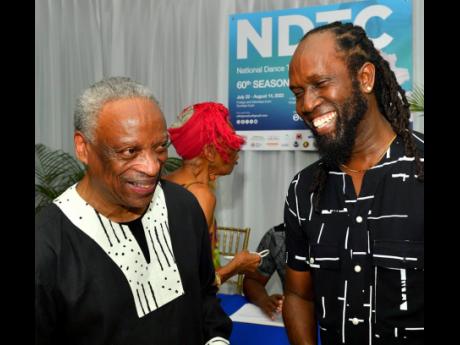 NDTC Chairman Milton Samuda (left) shares a laugh with Michael Holgate, artistic director, The ASHE Company.