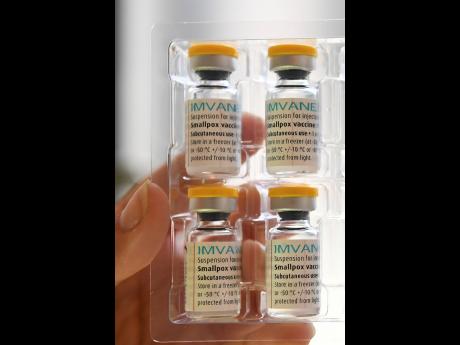 A health professional shows doses of Monkeypox vaccines at the Edison municipal vaccination centre in Paris on Wednesday, July 27.