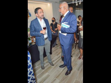 We captured Sotheby’s Director Daniel Melville (left) in conversation with Michael Banbury, co-founder of First Rock Capital.