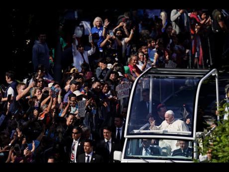 Pope Francis arrives for mass at the National Shrine of Saint Anne de Beaupre on Thursday, in Saint Anne de Beaupre, Quebec. Pope Francis is on a “penitential” six-day visit to Canada to beg forgiveness from survivors of the country’s residential sch