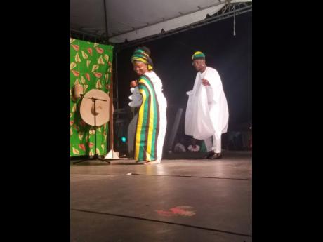 Credit: Paul H Williams A Yoruba ‘couple’ from Nigeria dances in traditional attire with a Jamaican twist at the Emancipation jubilee vigil at the Seville Heritage Park in St Ann on Sunday night.