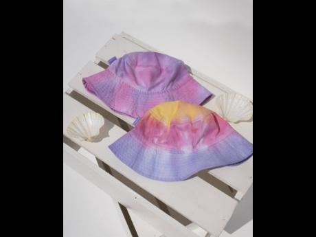 Joined Feeling’s new Sweet Escape and Sunburst bucket hats that are featured in the Feels Like Summer Collection.