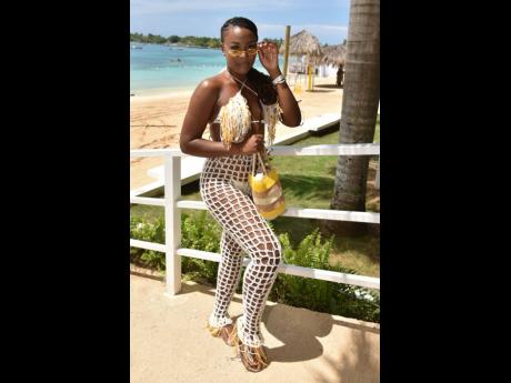 Credit: Kenyon Hemans The only thing that Ana Campbell, director of Analytical Designs, wanted to analyse was the beach while rocking Marabelle’s ‘Briana’ design at Puerto Seco Beach Park on Sunday.