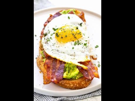 Bacon and tomato avocado toast.