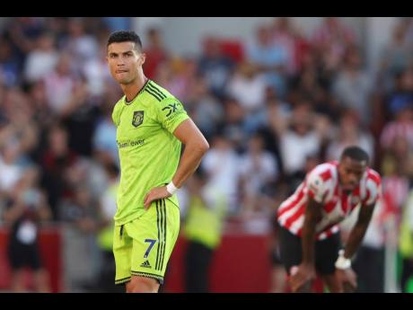 Manchester United’s Cristiano Ronaldo looks around after the end of the English Premier League soccer match between Brentford and Manchester United at the Gtech Community Stadium in London yesterday.