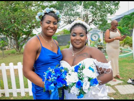 Credit: Shot by Matt Samantha, who now goes by the title Mrs Blake, is photographed alongside her bridesmaid, Cathtonia Betty.